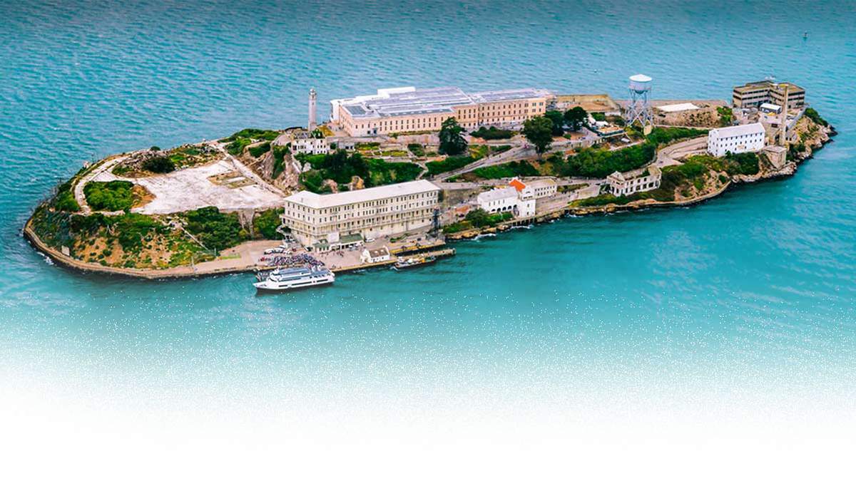 Aerial view of the entire Alcatraz Island as a black and white photo in San Francisco, California, USA